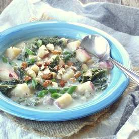 Creamy Vegan Potato Kale Soup with Smoked Almonds